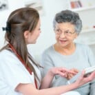 Doctor and older person