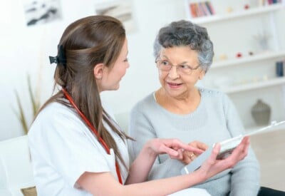 Doctor and older person