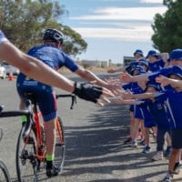 Cyclists with school students