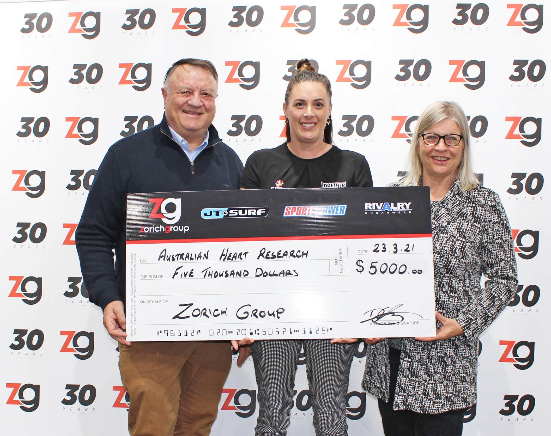 Zorich Group giving cheque min
