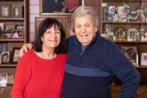 Prostate cancer fighter Charlie and his wife Lina smile at the camera
