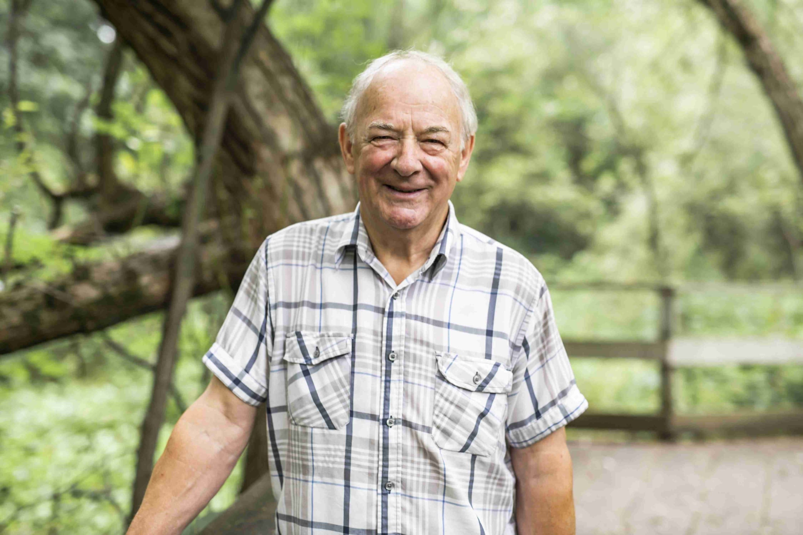 older man smiling at camera