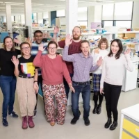 phil gregory and team happy in lab 2 580x390.jpg
