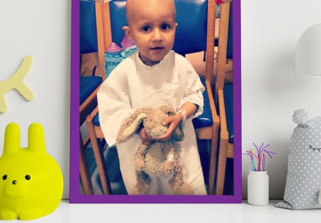 Framed photograph of Edwina during her neuroblastoma (childhood cancer) treatment.