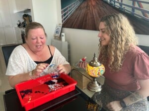Jane with QEH art therapist Gabby in palliative care doing art therapy
