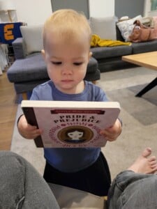 Toddler holding book