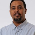 Dr Tesfahun Eshetie, looking towards camera, wants to empower carers and improve quality of care for older people.