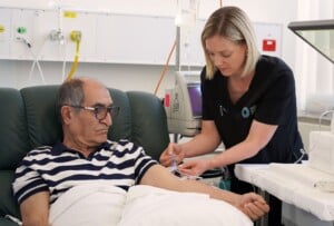 1000th dose patient Manny Haghigi with nurse Jess Mercurio