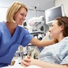 Doctor and patient smiling at each other